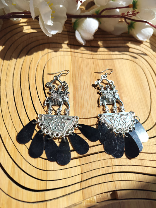 TIP - This Beautiful Elephant Work Dangles Earrings From Brand Stylo Tiska  . You Can Style On Almost all Kinda Outfits Ex- Suit , Saree, Indowestern Outfit or Western Too. So What Are You Waiting For Grab Now and Play Your Slay Game.

Brand - Stylo Tiska